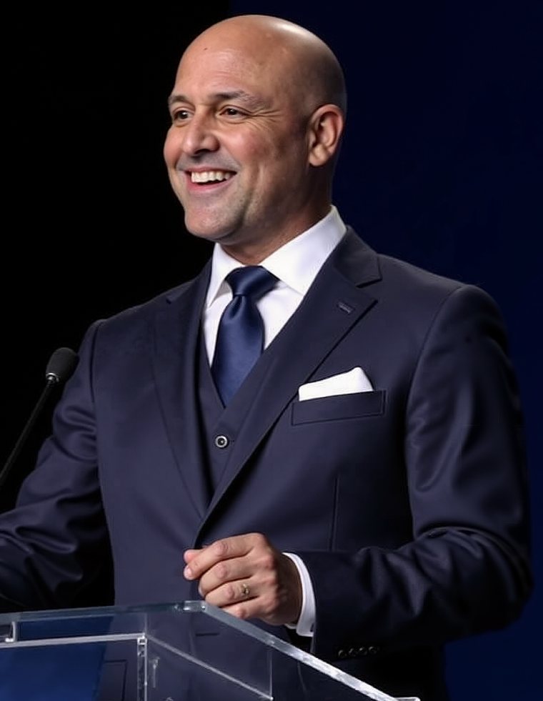 Derek B. Davis speaking at a podium